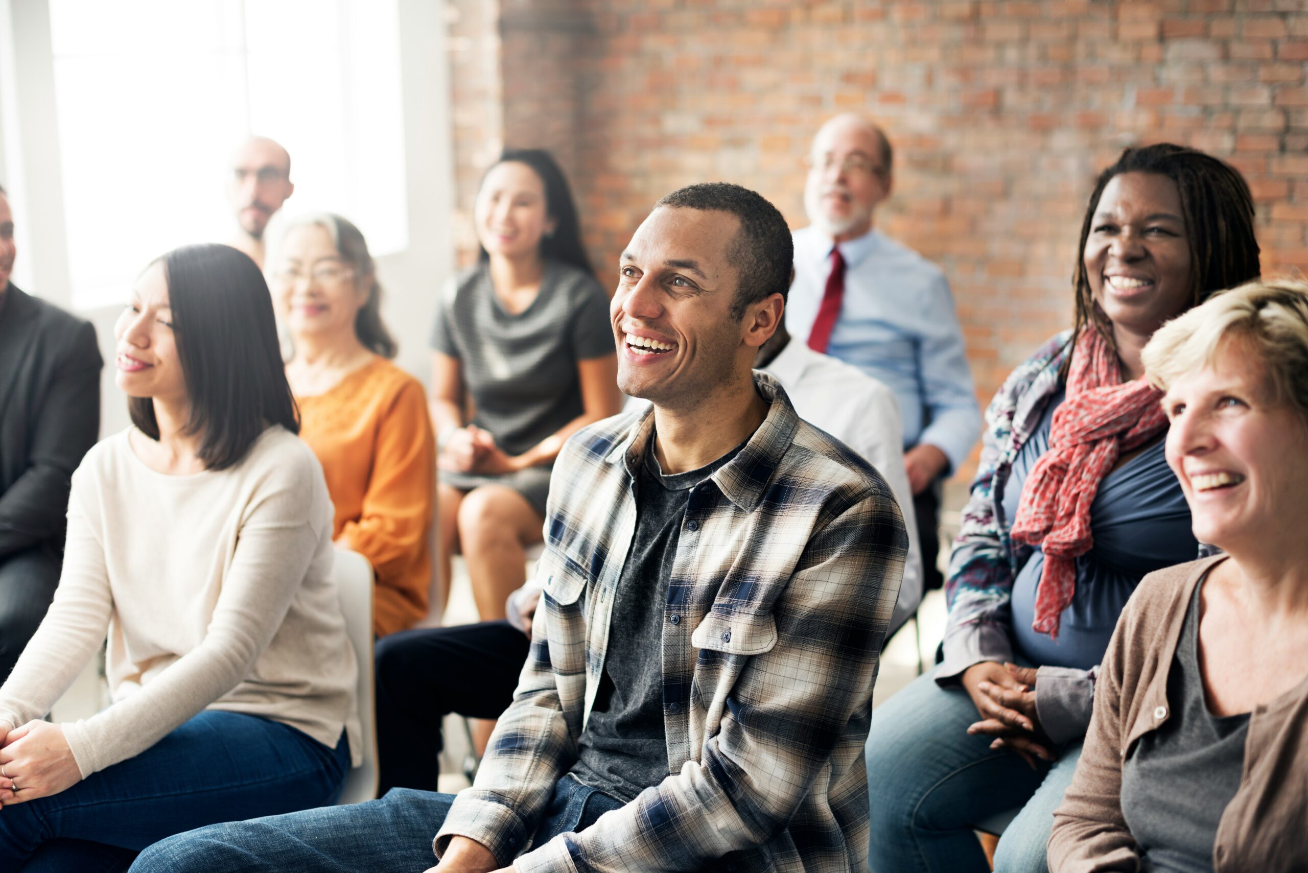 Happy audience smiling