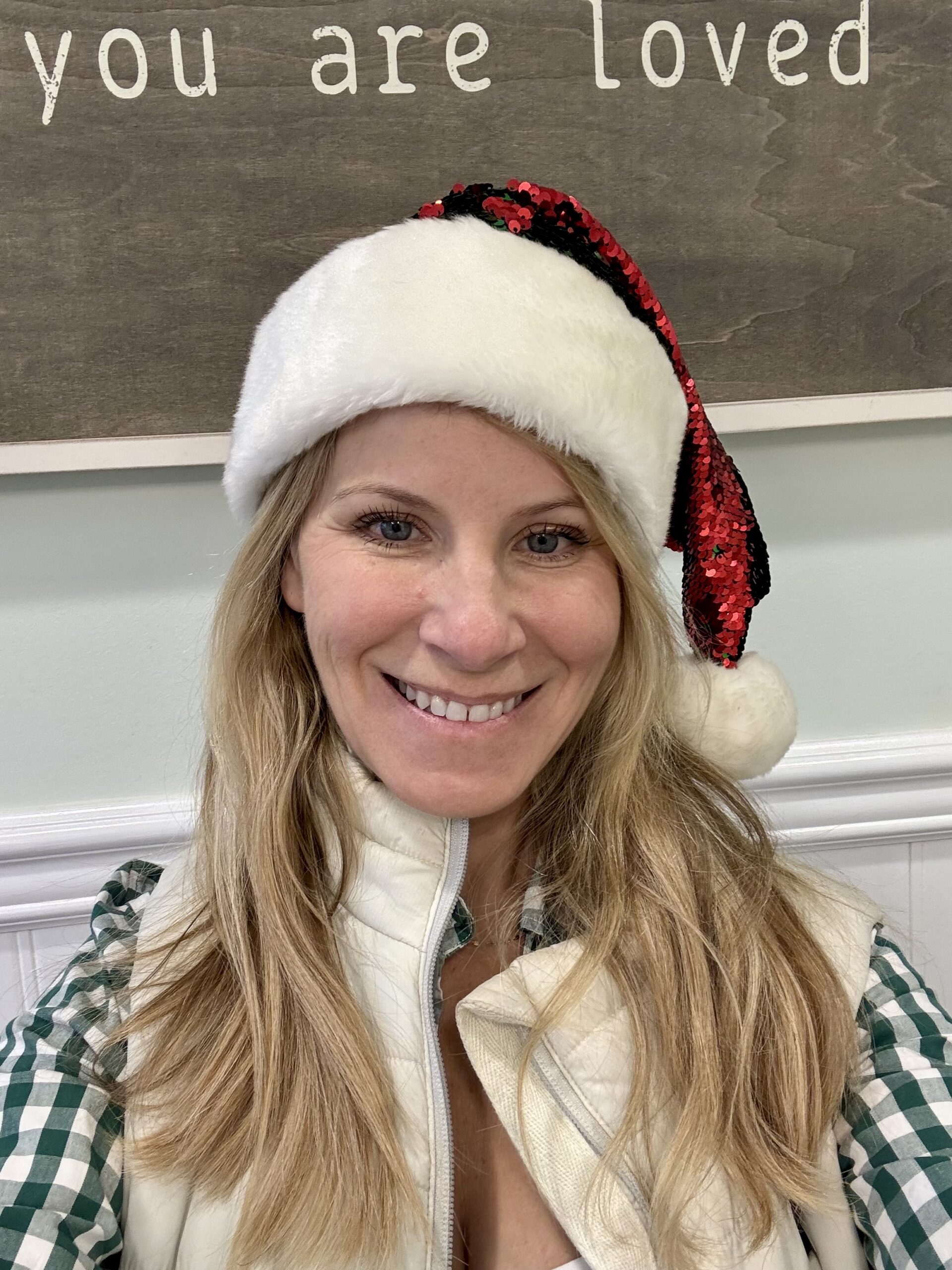 Photo of Beth Tyson in a Santa Hat