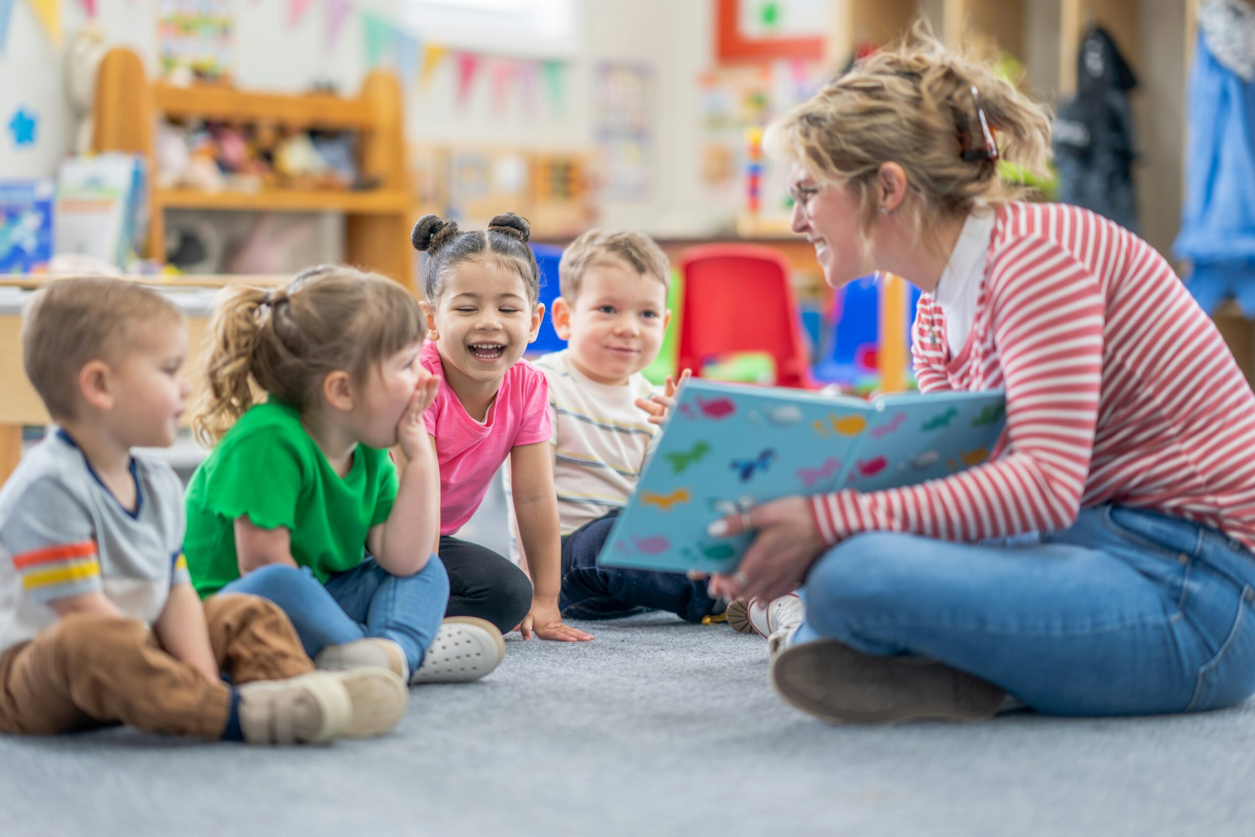 teacher with preschool students